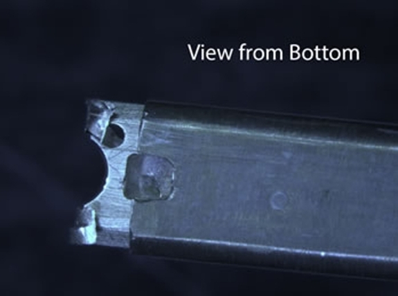 An image of the damaged Gatan 914  Cryo-Tomography holder, specifically showing the view from the bottom of the holder.