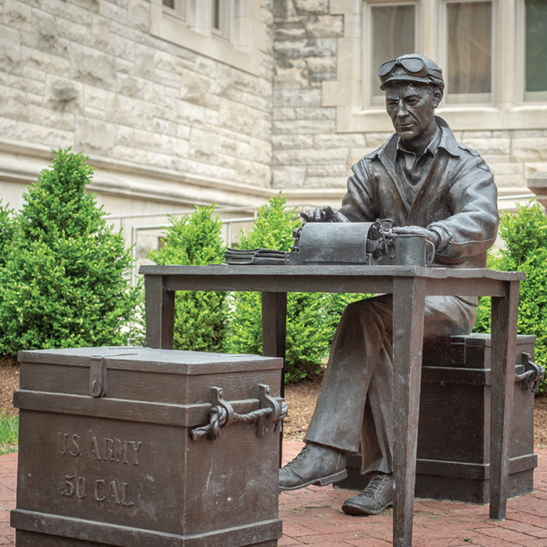 A statue of Ernie Pyle from the front entrance of Simon Hall.