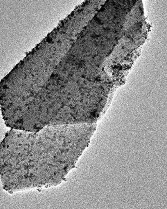 An image of a zeolite showing that its atomic ordering (striations) have totally vanished due to the electron beam.
