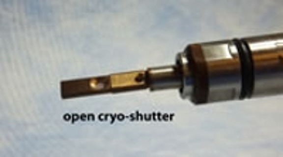 A closeup view of Gatan Model 626 Cryo-Holder showing the open cryo-shutter.